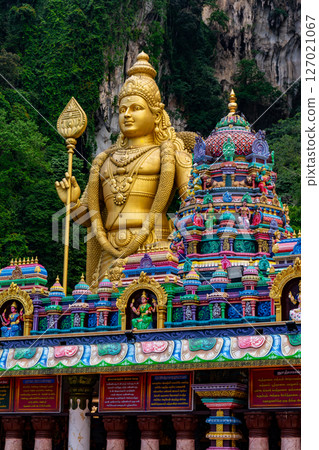 Gombak, Selangor Malaysia: April 18 2025: Batu Caves and the Murugan statue (The Hindu god of war ) also known as Kartikeya , Skanda, Subrahmanya and Shanmukha. Gombak, Selangor Malaysia: April 18 2025: Batu Caves and the Murugan statue (The Hindu god of war ) also known as Kartikeya , Skanda, Subrahmanya and Shanmukha. 127021067