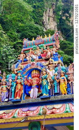 Gombak, Selangor Malaysia: April 18 2025: Batu Caves and the Murugan statue  (The Hindu god of war ) also known as Kartikeya , Skanda, Subrahmanya and Shanmukha. 127021081