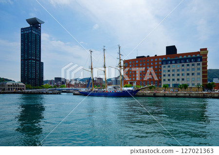 Mojiko Retro Observation Room and ships moored at the quay, including sailing ships 127021363