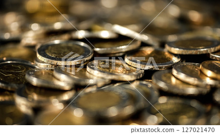 Euro coins forming a large pile of money Euro coins forming a large pile of money 127021470