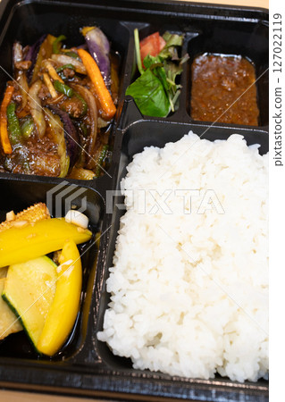 Delicious Chinese bento with stir-fried eggplant and minced pork 127022119