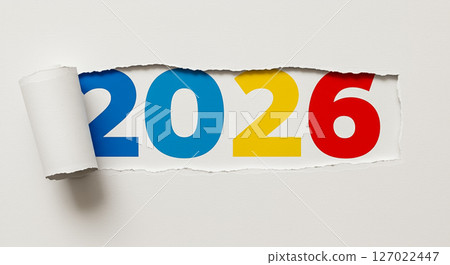 Colorful 2026 numbers under torn paper concept showing hidden New Year message in simple minimalist design Colorful 2026 numbers under torn paper concept showing hidden New Year message in simple minimalist design 127022447