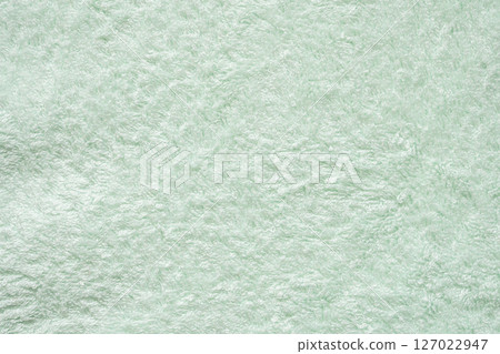 Green fluffy towel fabric soft texture background Green fluffy towel fabric soft texture background 127022947