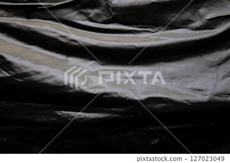 Black plastic bag texture background 127023049