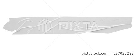 White adhesive plastic tape isolated on white background White adhesive plastic tape isolated on white background 127023282