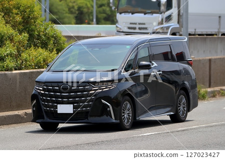 Image of a luxury black minivan Image of a luxury black minivan 127023427