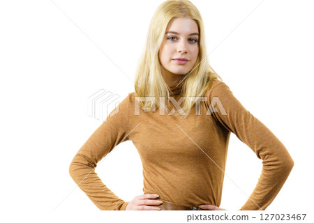 Woman wearing suede top golf Woman wearing suede top golf 127023467