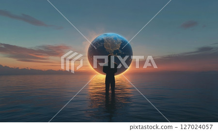 Silhouette of a person with earth at sunset over ocean, concept of global connection 127024057