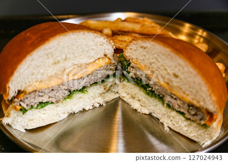 Homemade hamburger cut in half 127024943