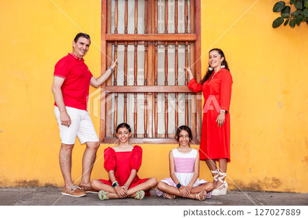 Young family of four traveling together. Family love concept. Travel concept. Cartagena de Indias. 127027889