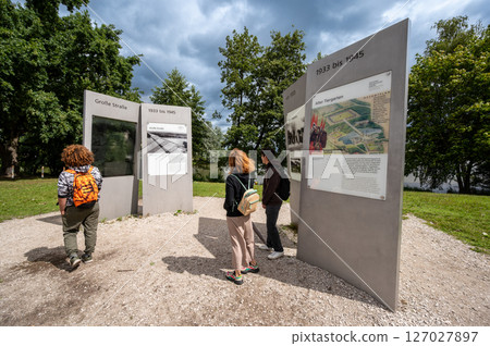 Nuremberg, Germany, August 3, 2023. A group of tourists look at information signs at the Nazi party rally site. 127027897