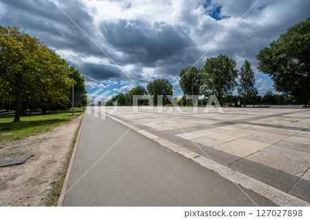 Nuremberg, Germany, August 3, 2023. View of Grosse Strasse in the Nazi party rally area. It is the long straight road where Nazi parades, travel destinations, took place. 127027898