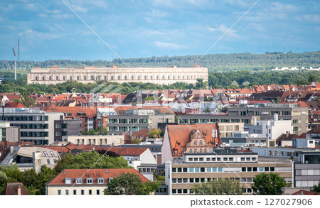 Nuremberg, Germany, August 3, 2023. Cityscape from the hill, on the outskirts stands the congress center: a gigantic unfinished work from the Second World War of the Nazi regime. Nuremberg, Germany, August 3, 2023. Cityscape from the hill, on the outskirts stands the congress center: a gigantic unfinished work from the Second World War of the Nazi regime. 127027906
