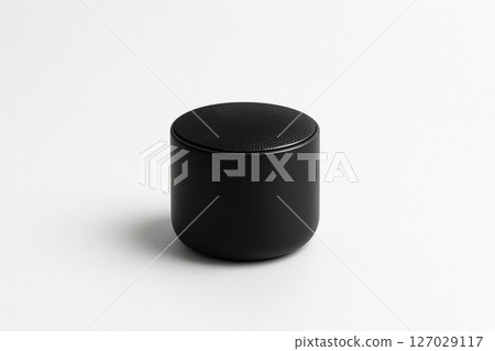 A simple black speaker on a white background 127029117