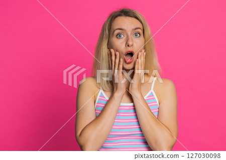 Shocked amazed woman surprise looking at camera with big eyes, shocked by sudden victory wow emotion Shocked amazed woman surprise looking at camera with big eyes, shocked by sudden victory wow emotion 127030098