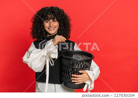 Woman taking off, throwing out glasses into bin after medical vision laser treatment therapy surgery Woman taking off, throwing out glasses into bin after medical vision laser treatment therapy surgery 127030104
