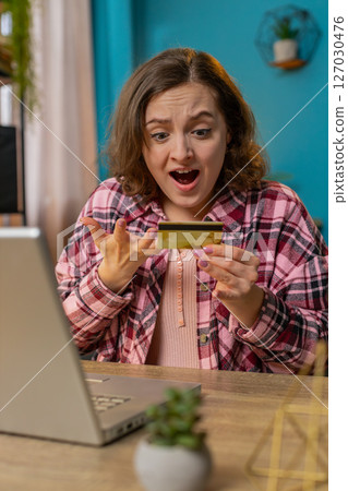 Angry stressed freelancer woman try to pay online shopping with laptop blocked refuse credit card 127030476