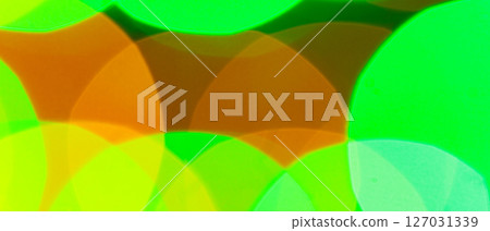 Vibrant Abstract Bokeh Background Featuring Overlapping Green Orange and Yellow Blurred Glowing Lights Effect 127031339