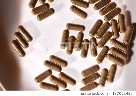 Drug pills on a tray 127031423