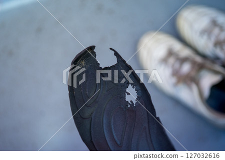 Holes in the toes of shoe insoles Holes in the toes of shoe insoles 127032616