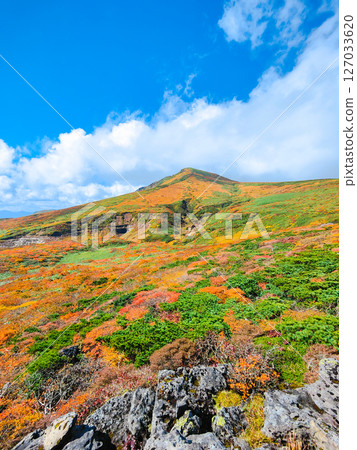Climbing Mount Kurikoma in autumn (view of Mount Kurikoma from Mount Higashi-Kurikoma) Climbing Mount Kurikoma in autumn (view of Mount Kurikoma from Mount Higashi-Kurikoma) 127033620