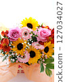 A bouquet of early summer flowers in yellow, pink, white, red and orange 127034027