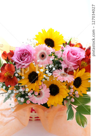 A bouquet of early summer flowers in yellow, pink, white, red and orange A bouquet of early summer flowers in yellow, pink, white, red and orange 127034027