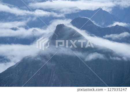 Machu Picchu mountain covered in thin clouds Machu Picchu mountain covered in thin clouds 127035247
