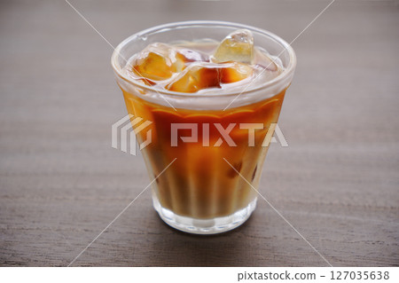 Image of iced milk tea with ice 127035638