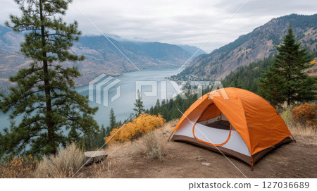 Orange tent mountain lake forest outdoor camping scenic peaceful adventure travel Orange tent mountain lake forest outdoor camping scenic peaceful adventure travel 127036689