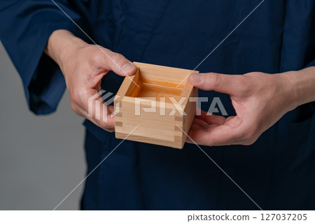Man wearing work clothes, hands Man wearing work clothes, hands 127037205