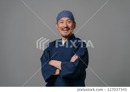 Portrait of a man wearing a work uniform 127037345