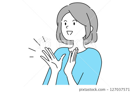 Smiling young woman expressing her admiration with applause 127037571