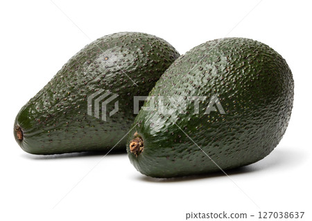 Two Ripe organic green avocado fruits isolated on white background with built-in clipping path 127038637