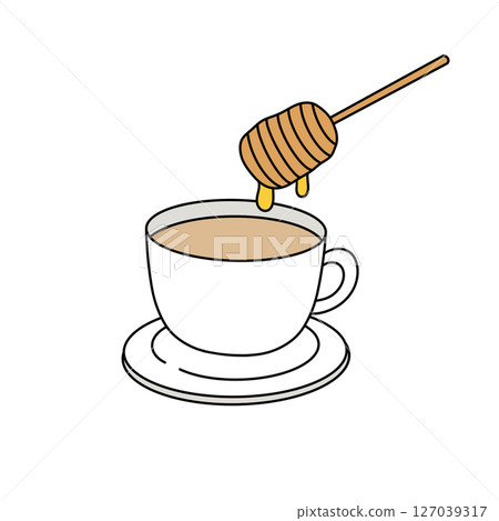 A cup of tea with a spoon in it and honey drizzled on top 127039317