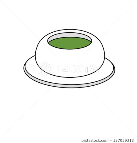 A white bowl with green liquid in it A white bowl with green liquid in it 127039318