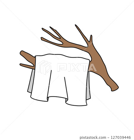 A white towel is hanging on a tree branch A white towel is hanging on a tree branch 127039446
