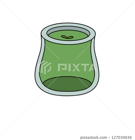 A green glass jar with a green apple inside 127039836