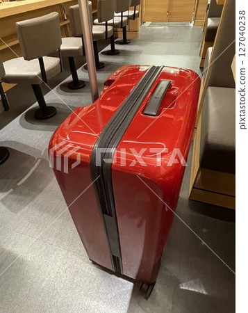 Red suitcase Red suitcase 127040238