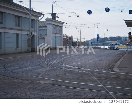 Finland, Helsinki city, early morning in May, cloudy, tram 127041172