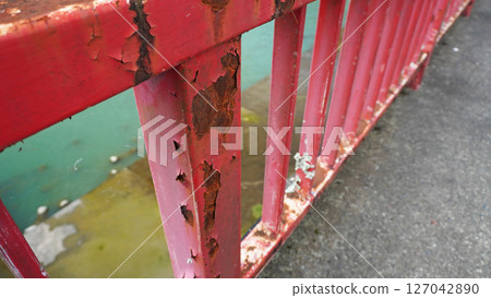 Corroded and peeling paint film 127042890