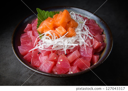 Tuna and Salmon Sashimi Rice Bowl with Shredded Daikon Tuna and Salmon Sashimi Rice Bowl with Shredded Daikon 127043317