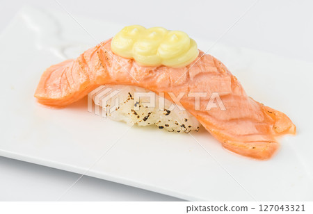Grilled Salmon Nigiri Sushi Topped with Creamy Mayonnaise Sauce Grilled Salmon Nigiri Sushi Topped with Creamy Mayonnaise Sauce 127043321