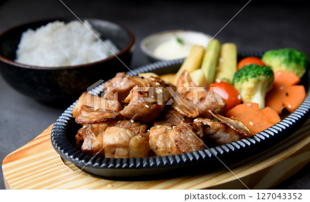 Japanese-Style Pork Steak Cubes with Rice and Vegetables Japanese-Style Pork Steak Cubes with Rice and Vegetables 127043352