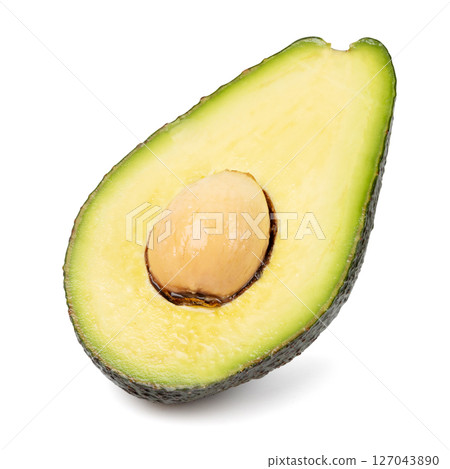 Healthy food and ingredients - Half of ripe organic green avocado fruit with pit isolated on white background with built-in clipping path Healthy food and ingredients - Half of ripe organic green avocado fruit with pit isolated on white background with built-in clipping path 127043890