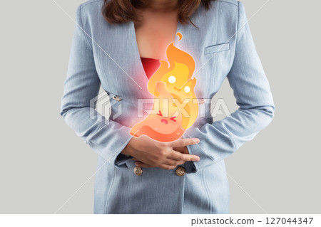 This image shows the symptoms of acid reflux and heartburn. 127044347