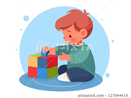 A boy is playing with toy blocks. 127044419