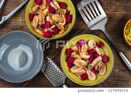 Shrimp cooked in a fruit marinade. Shrimp cooked in a fruit marinade. 127045014