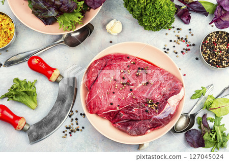 Piece of raw beef meat. 127045024