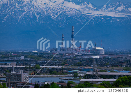 Toyama Shinko Thermal Power Plant and the Tateyama mountain range as seen from the Takashi Miharashi in Keta Forest Toyama Shinko Thermal Power Plant and the Tateyama mountain range as seen from the Takashi Miharashi in Keta Forest 127046838